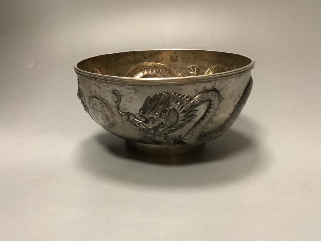 A late 19th/early 20th century Chinese Export bowl by Wang Hing, with engraved inscription and embossed with dragons, on circular foot, diameter 16.2cm, 11.5oz.